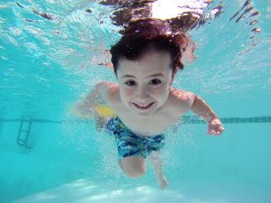 Picture of kid in a pool.