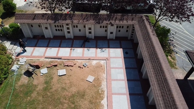 Extensive construction of bricks and pavers that redesigned an entire church columbarium along with adding a tranquil inner garden space.