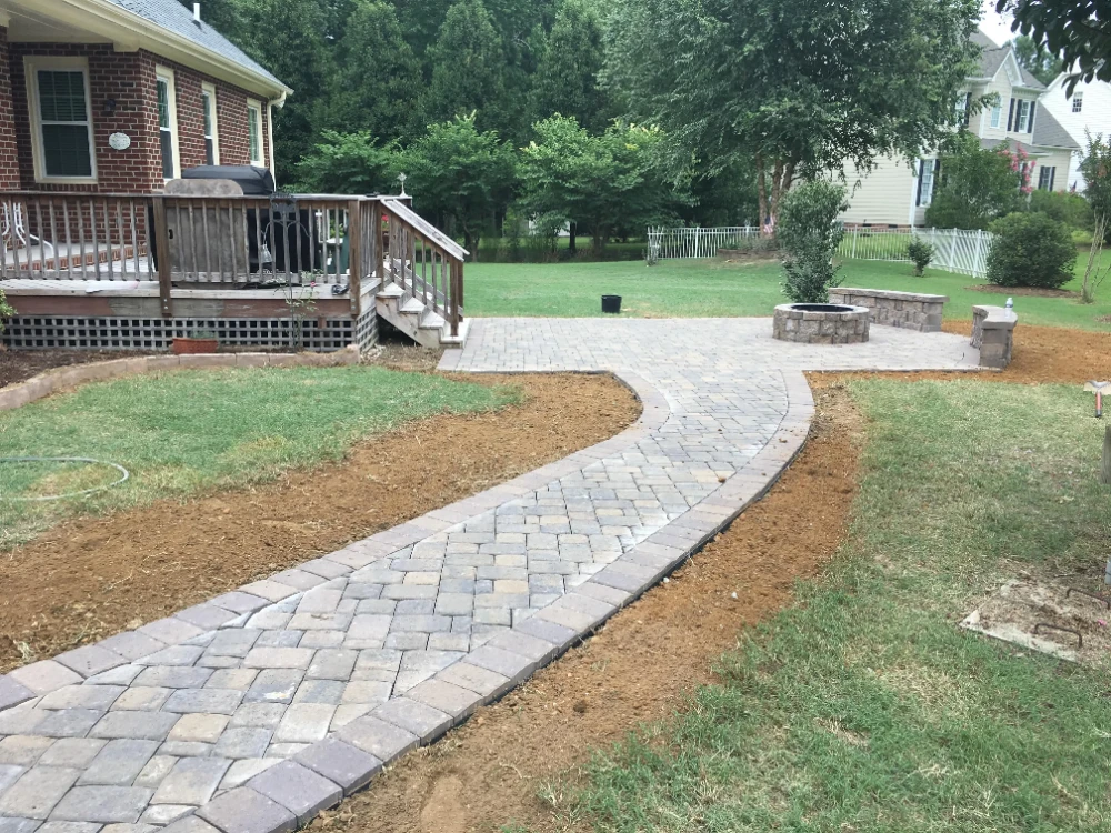 Completed brick pathway and patio in back yard