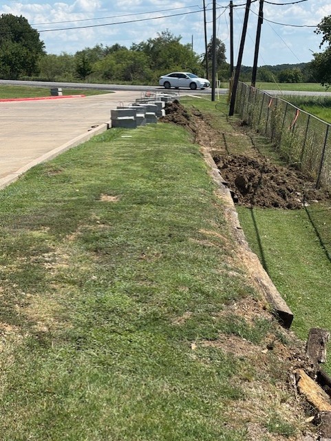 Existing crosstie retaining wall before removal