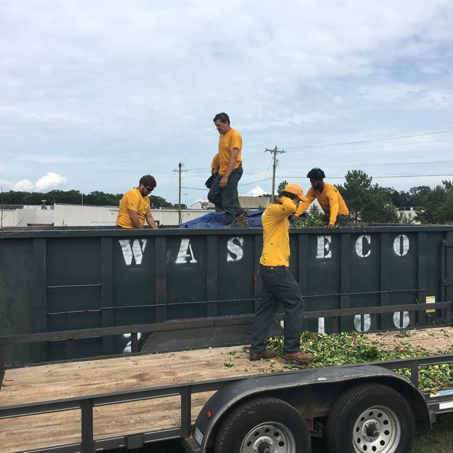 Employees engaged on cleaning activities