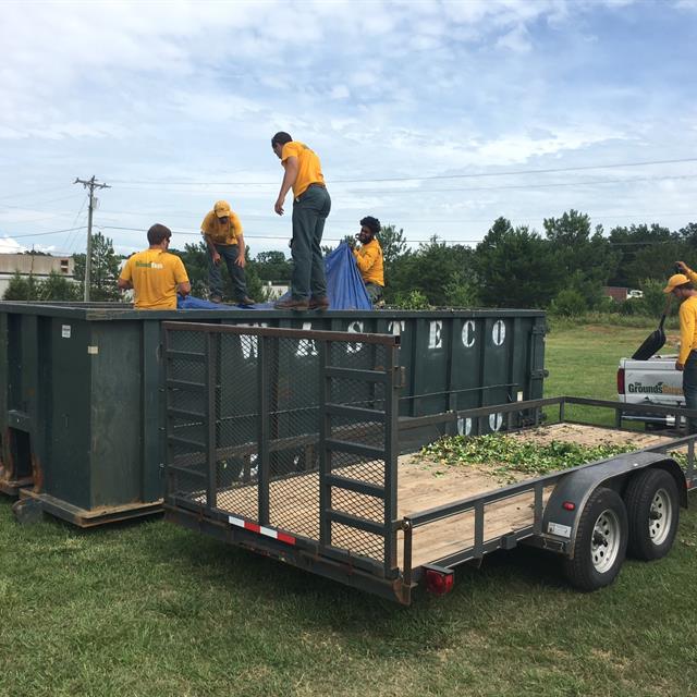 Employees engaged on cleaning activities