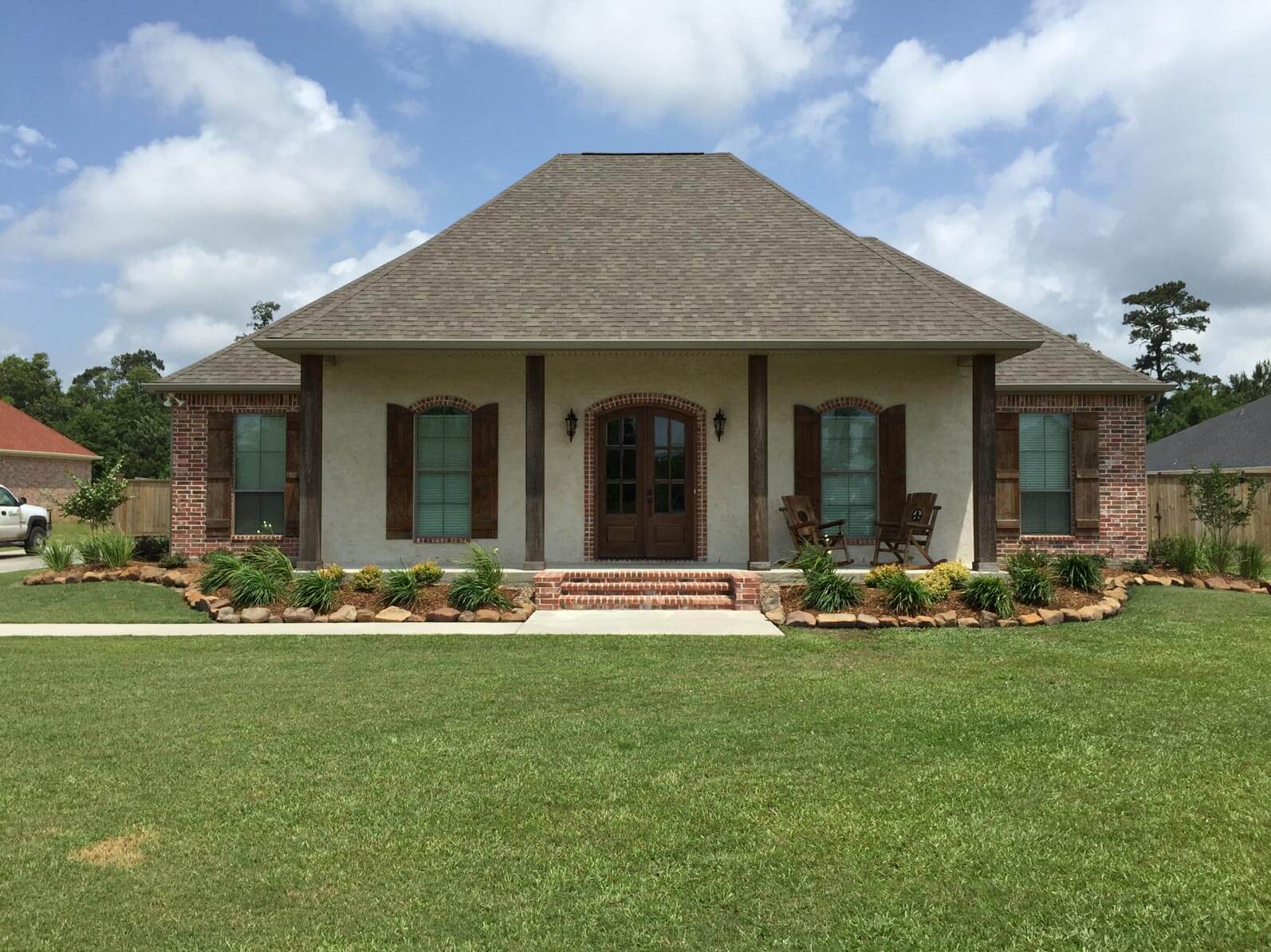 Front of house with grass yard