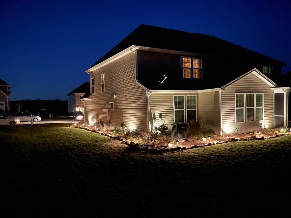 Landscape lighting around the entire home perimeter to enjoy the beautiful landscape as well as more functional night time gatherings during warmer months.
