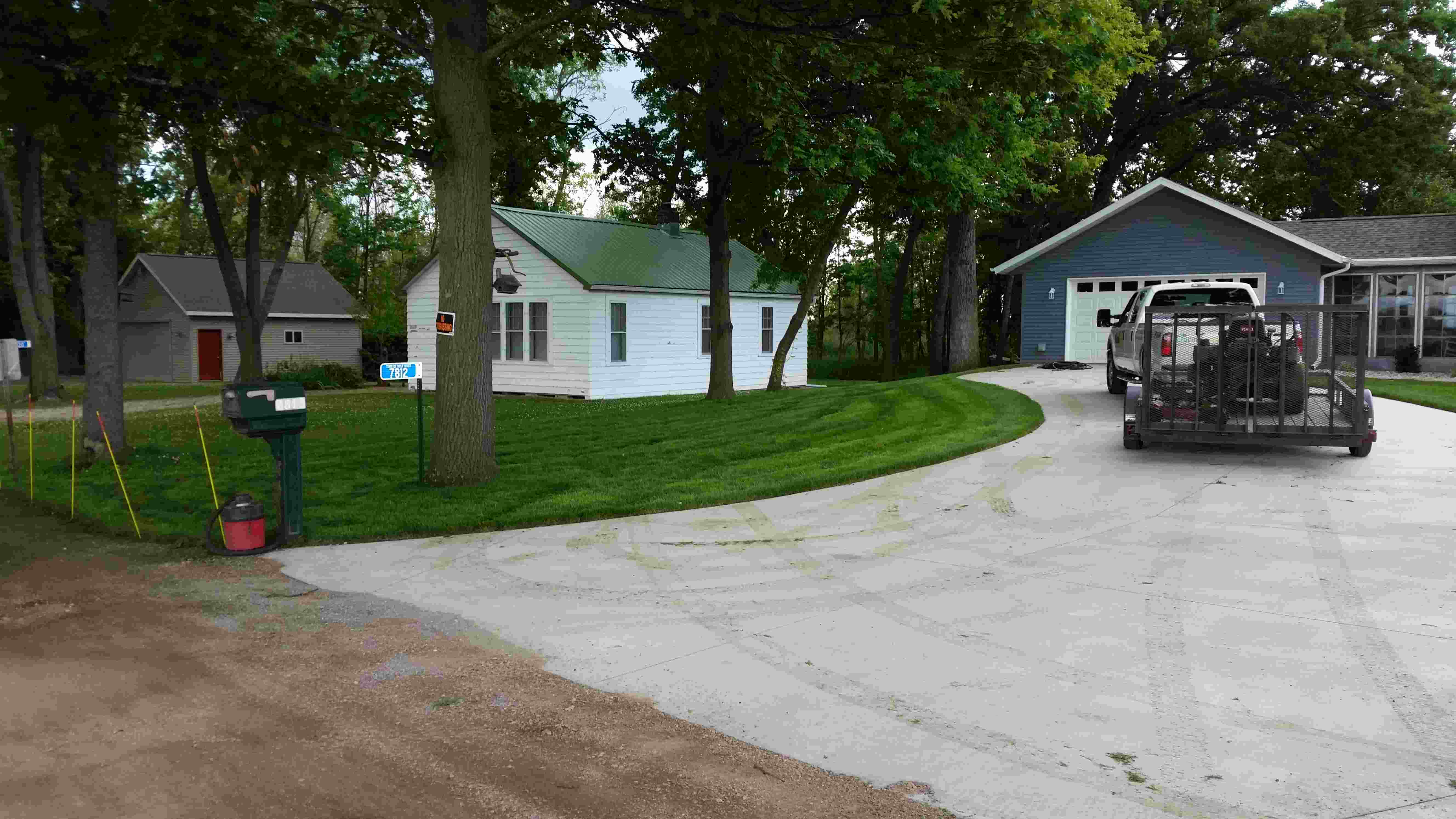 driveway and freshly mowed lawn