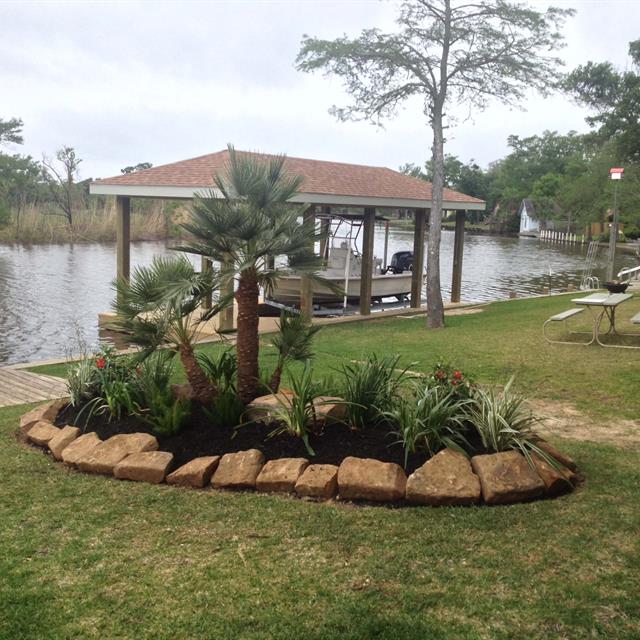 Grass yard with Stone Decor landscape view