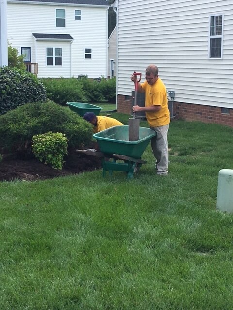 Grounds Guys working 