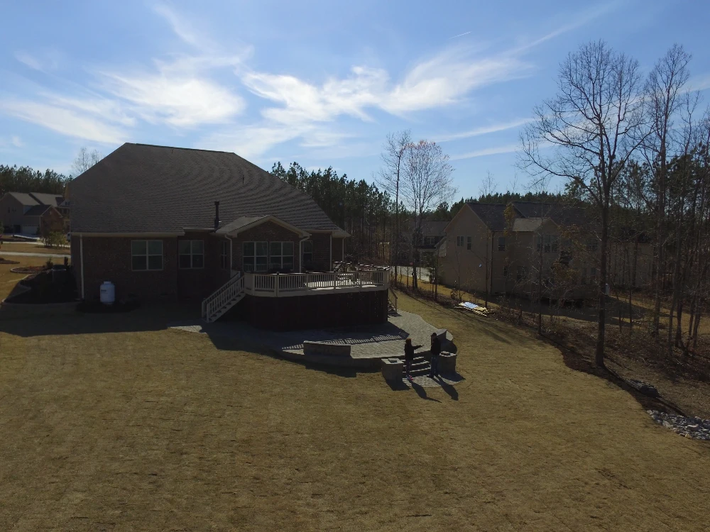 Home on large plot of land with blue sky