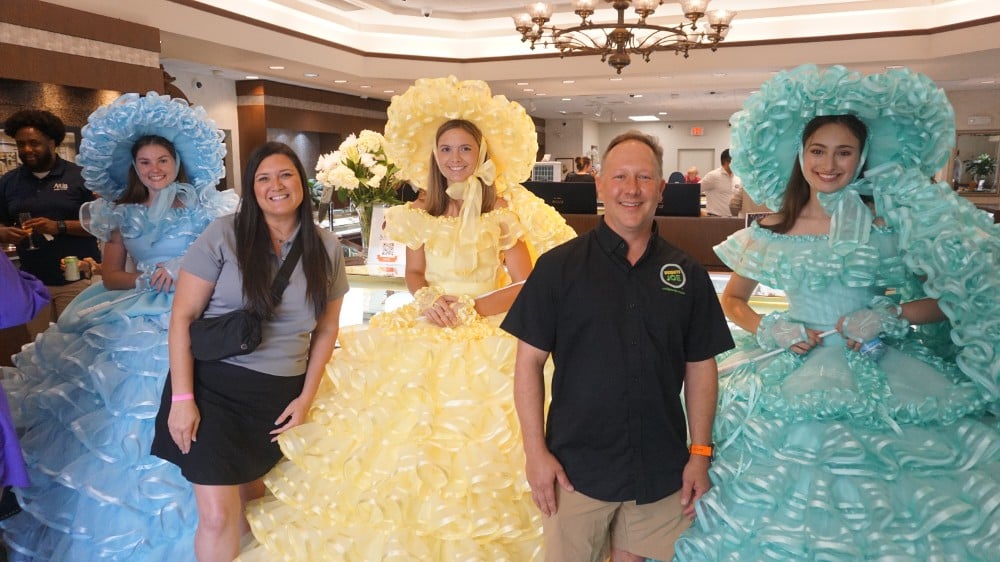 Mosquito Joe employees meeting the Mobile Azalea Trail Maids