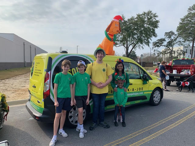 Mosquito Joe of Northwest Florida kids at a Christmas Parade