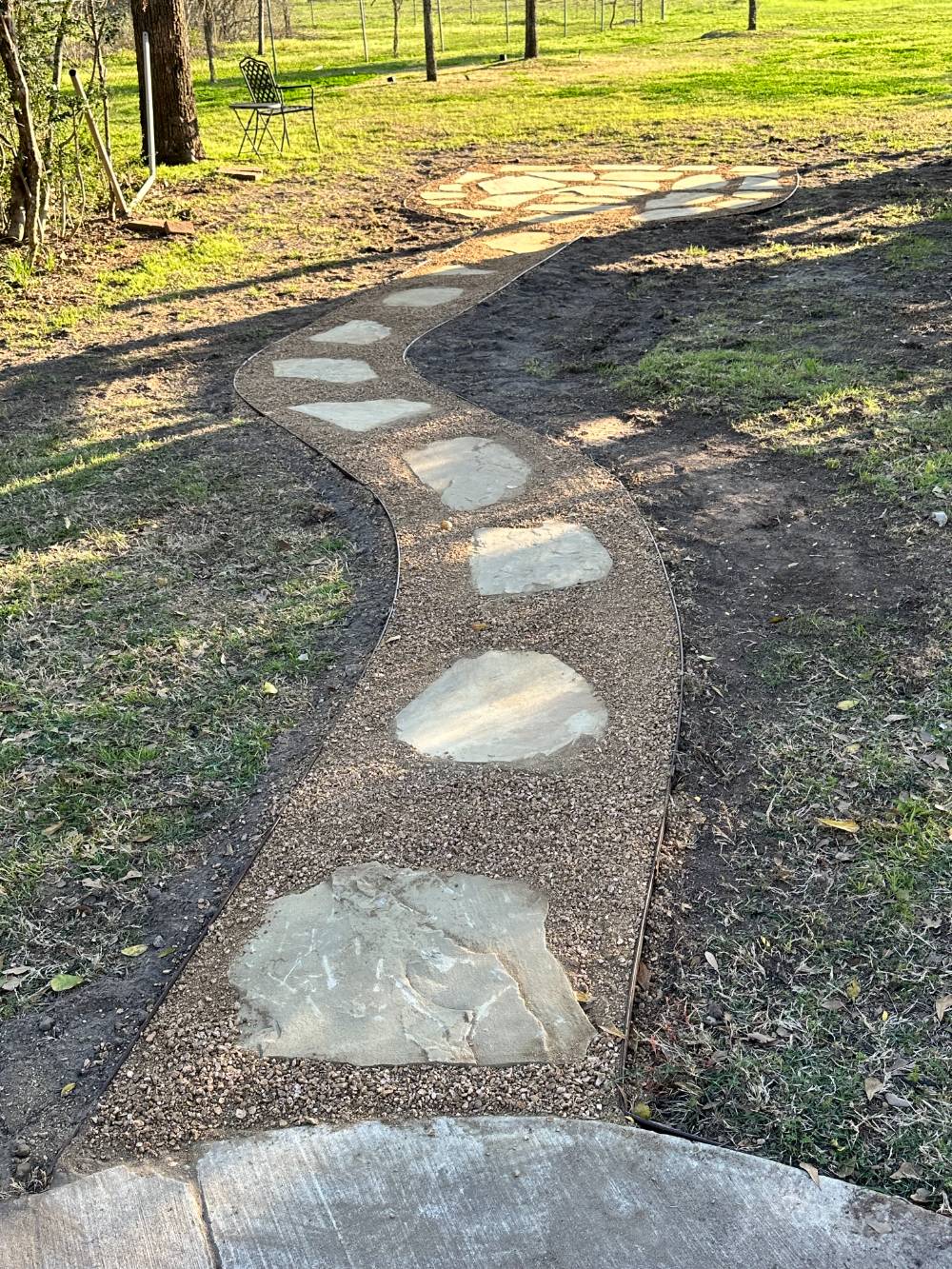Flagstone and decomposed granite path.