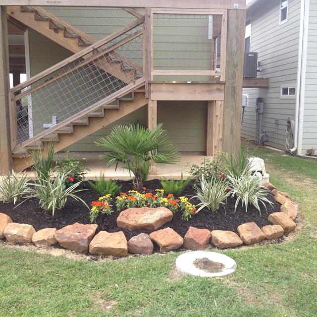 Plantation of plants with stone decoration