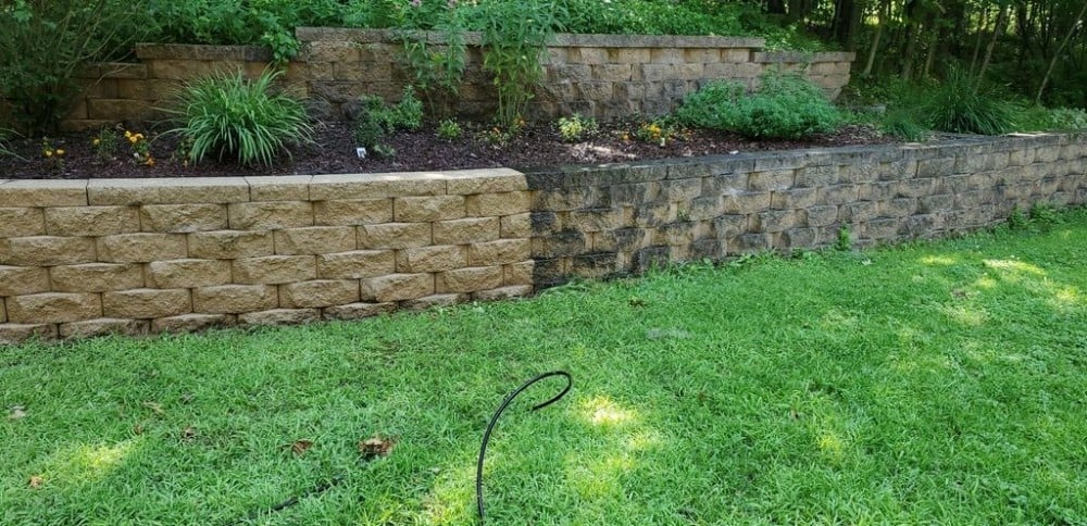 Pressure wash retaining wall.