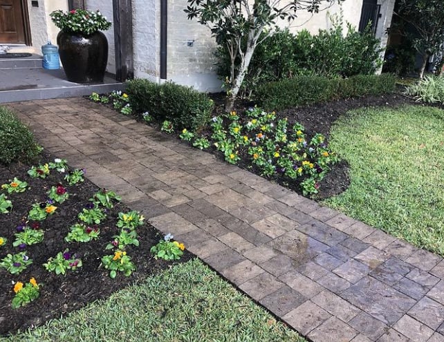 The Grounds Guys of Memorial Park Flower Bed