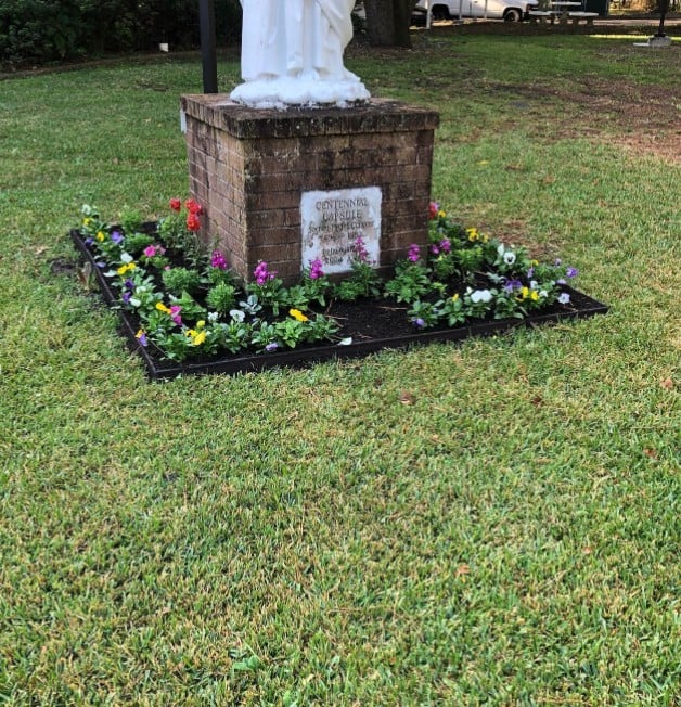 The Grounds Guys of Memorial Park Flower Bed