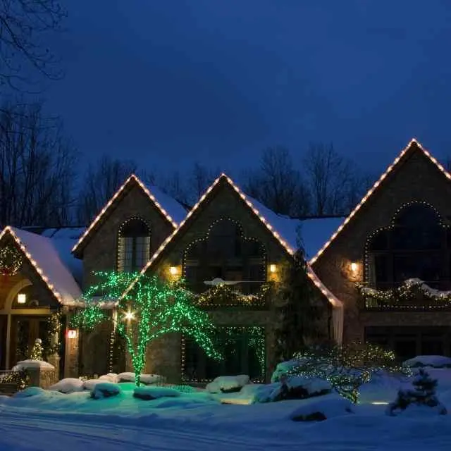 holiday lights on a home at night