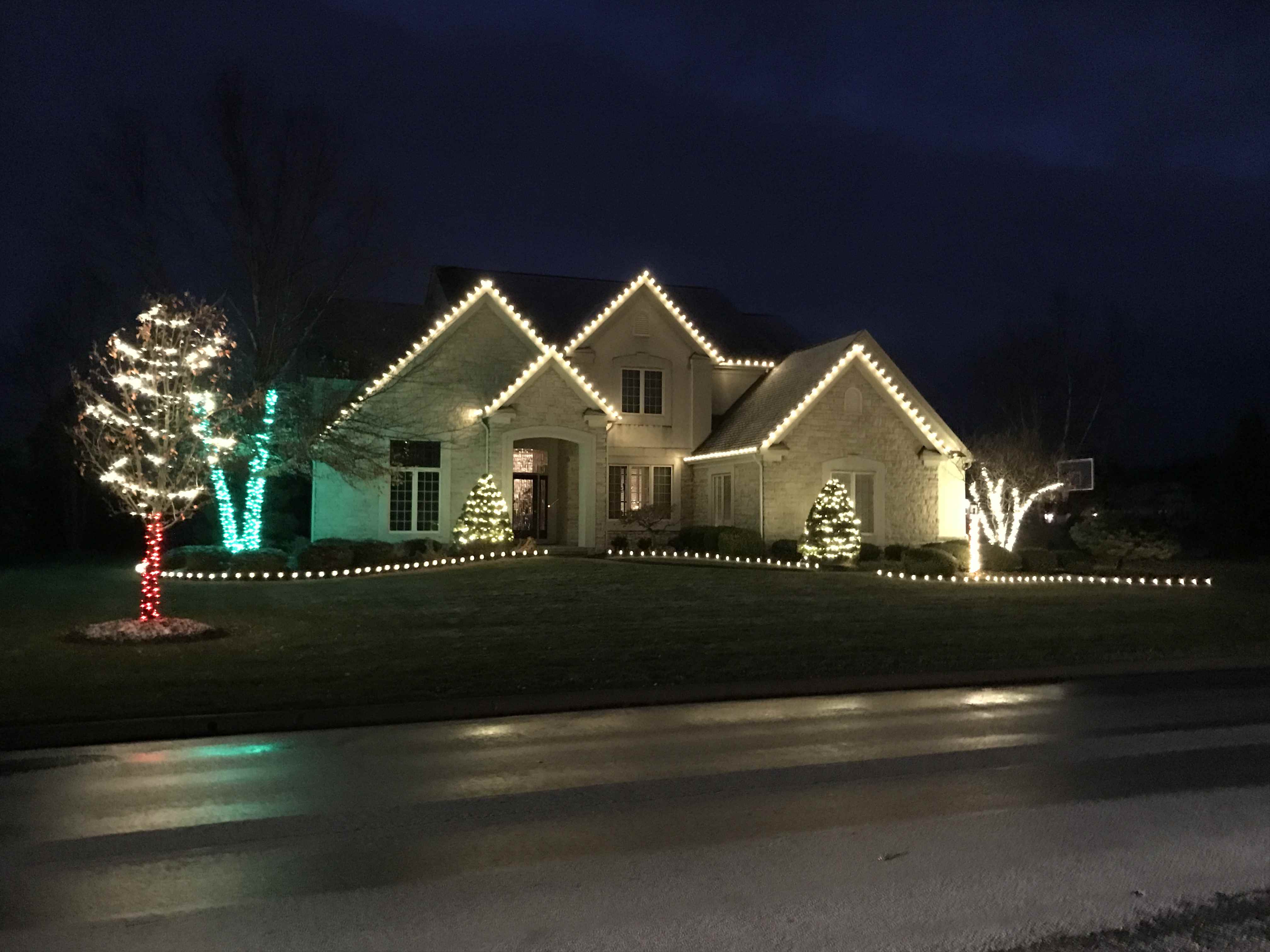 house lit by holiday lights