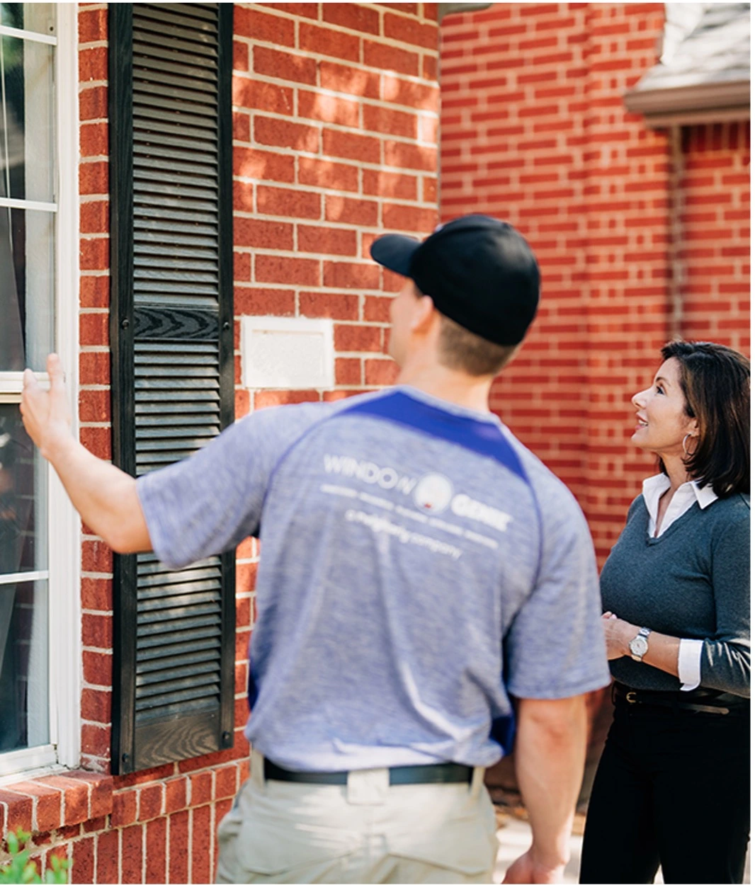 Window Genie Professional Presenting Customer the window