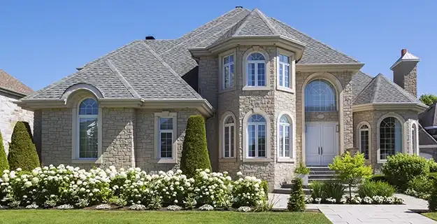 Large single-family home with pressure-washed exterior.