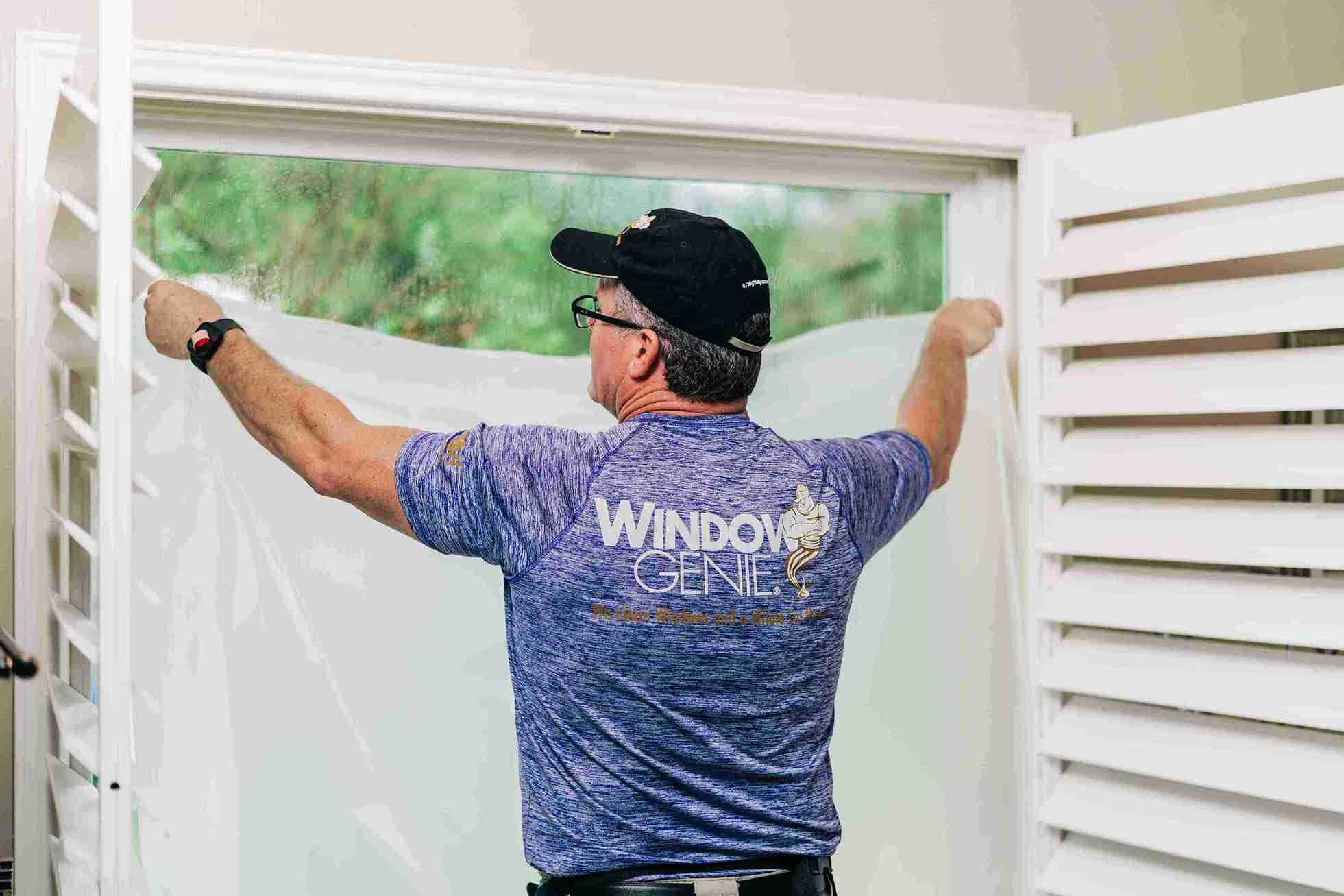 Window Genie professional installing solar control window film.