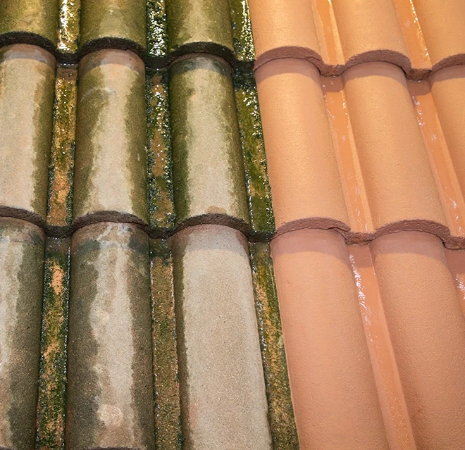 Before and after roof pressure washing.