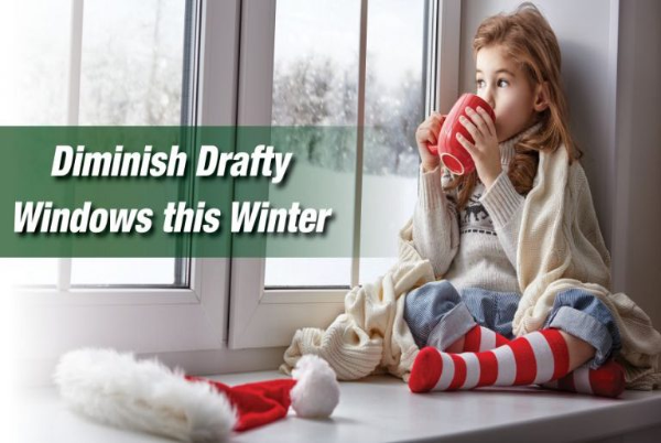 A kid sipping from the cup and enjoying the beauty outside the window.