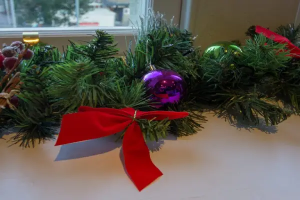 Christmas garland with red ribbon