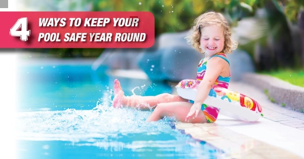 A kid playing in a pool.