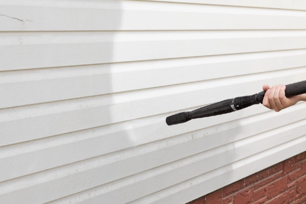 pressure washing garage.