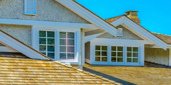 Second story windows of a home.