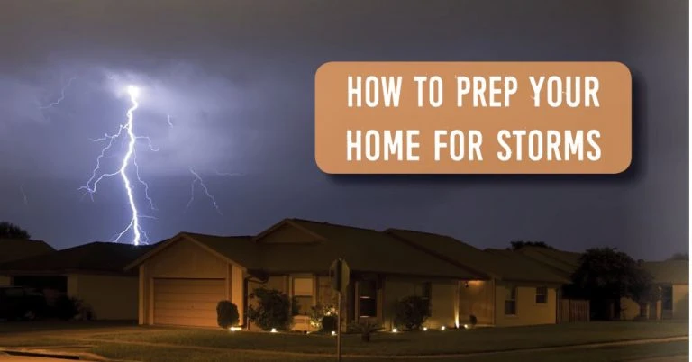 Lightning storm in background over home.