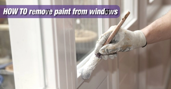 Painter painting window frames