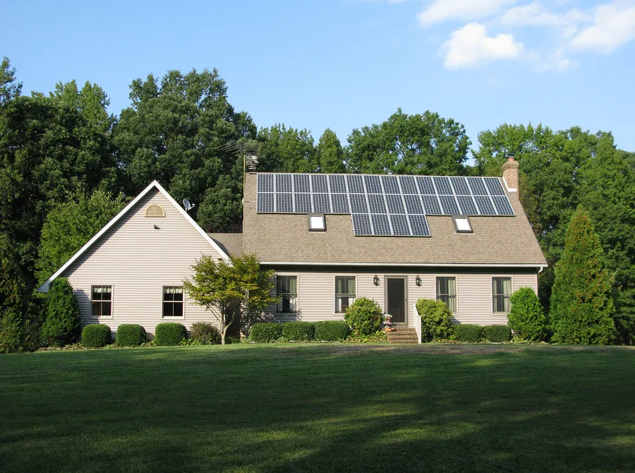 house with solar panels on the roof.