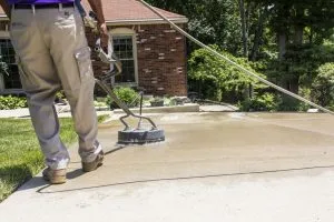 pressure washing concrete.