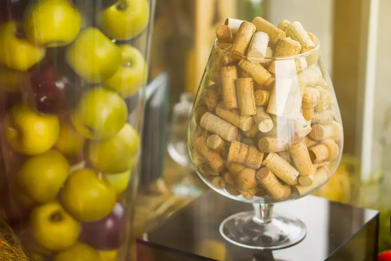 large glass corks. decorated. apples in a vase